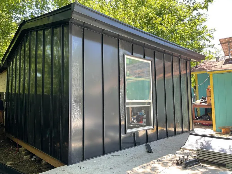 Black standing seam metal wall panels for Roof Inspection in Boone